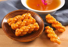 黃精茶攜手眾望小麻花，咸寧兩產(chǎn)品啟用“荊楚放心禮”標(biāo)識，助力地方品牌升級